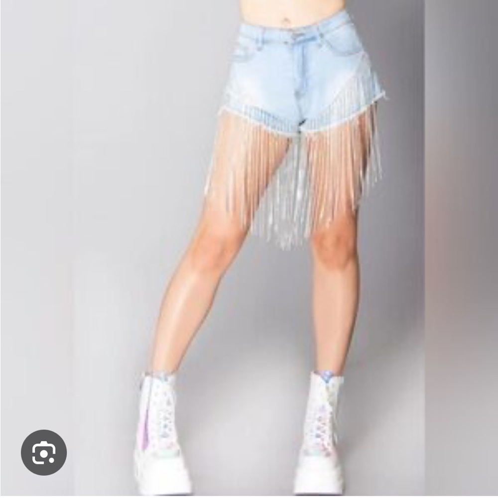 Hot & Delicious denim short with rhinestone fringes.